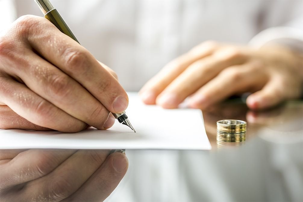 Experienced divorce lawyers consulting with a client in Owings Mills, MD