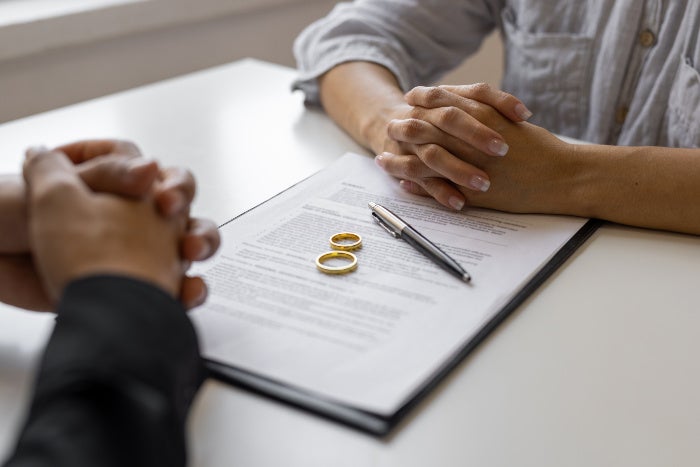 Attorney consulting a client about divorce proceedings in Owings Mills, MD